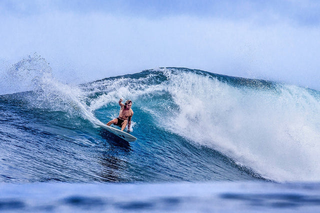 Pineapples, poke and pits. Harrison in Hawaii.