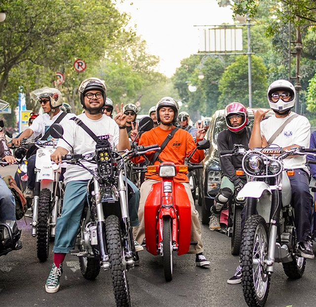 Riders stopped in the middle of the road during the Kumpul-Kumpul group ride in Indonesia