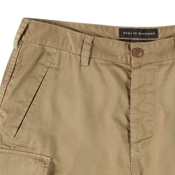 relaxed military cargo short with button fly closure, side cargo and back flap pockets, 100% raw cotton twill fabrication with heavy enzyme stone wash