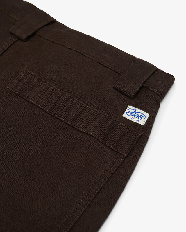 brown relaxed fit pant with branded label on back pocket, 100% heavy moleskin fabrication with a garment wash